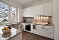 Stil und Charme: Möblierte 2,5-Zimmer-Wohnung mit Balkon in feinster Bogenhauser Lage - Moderne Küche