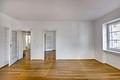 Raritätenlage von Schwabing - Imposante Altbauwohnung - Wohnzimmer Blick zum Flur