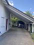 Freistehendes Ein-/ Zweifamilienhaus auf sonnigem Gartengrundstück mit viel Potenzial in Ottobrunn - Carport