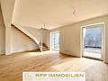 Exklusive Maisonettewohnung mit hochwertiger Kernsanierung & 3-Zi.-Option in Unterschleißheim-Lohhof - Wohnzimmer