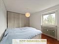 Renovierte 3-Zimmerwohnung mit sonniger West-Loggia in Oberschleißheim - Schlafzimmer