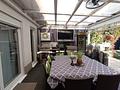 Kapitalanlage: moderne Doppelhaushälfte mit Einzelgarage in Duisburg-Hamborn - überdachte Terrasse mit Outdoor-Küche