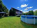 Wohnen im Grünen - Familienfreundliche DHH in Gilching - Gartenansicht mit Pool