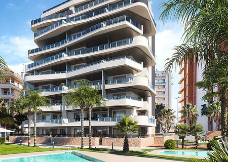 Appartements mit 2 Schlafzimmern, 2 Bädern, Tiefgaragenstellplatz, Gemeinschaftspool und schönem Ausblick nur 1.200 m vom Jachthafen und Strand