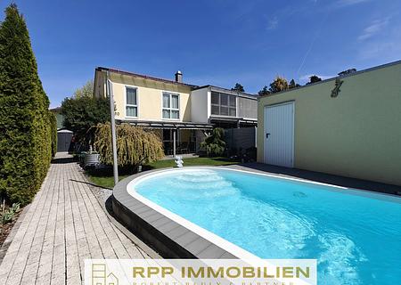 Moderne Doppelhaushälfte mit Salzwasserpool & West-Garten – exklusives Wohnen bei Unterschleißheim - Hausansicht