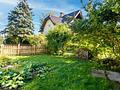 Charmante 2-Zimmer-Erdgeschosswohnung mit sonniger Terrasse, Garten & 2 Stellplätzen in Hofham - Garten