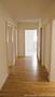 3-Zimmer-Wohnung mit Sonnenterrasse, 400 m² Gartenanteil und beheizten Hobby-Raum in Unterföhring! - Flur
