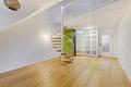 Über den Dächern Bogenhausens: Exklusive Galerie-Wohnung mit Loft-Flair und Balkon