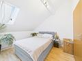 zur Kapitalanlage: Schöne Maisonette-Dachterrassenwohnung mit großem Ostbalkon in Taufkirchen - Schlafzimmer