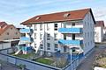 Herrlich große und helle Maisonette-Wohnung mit Balkon, Carport und Garage - Haus Gartenseite
