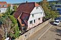 Langjährig vermietet & zentral: Zweifamilienhaus mit Sanierungsbedarf in Birkenfeld - Hausansicht Eingang