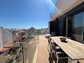 Neuwertige Penthouse-Wohnung mit 2 Schlafzimmern, 2 Bädern, Dachterrasse und Tiefgaragenstellplatz nur 700 m vom Strand