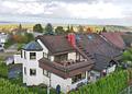 Exklusives Wohnambiente in Neuenbürg – Helle 3-Zimmer-Dachgeschosswohnung mit Balkon & Wellnessbad - Außenansicht Haus