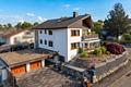 Charmantes Zweifamilienhaus mit gepflegter Gartenanlage und vermieteter Wohneinheit - Außenansicht