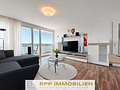 Attraktive 2-Zimmer-Wohnung mit großzügigem Balkon in zentraler Lage - Wohnzimmer