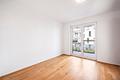 Neuwertige 3-Zimmer-Wohnung mit Wintergarten und Balkon - Schlafzimmer mit Balkonzugang