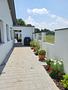 Neuwertiger Luxusbungalow mit sonnigem Garten in Top-Lage