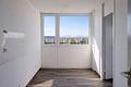 3-Zimmer Panorama-Eckwohnung im 10. OG mit Alpenblick, Südbalkon & Tiefgarage am Ostpark - Küche mit Ausblick