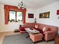 Vermietetes Zweifamilienhaus in Oberteisendorf mit Potenzial – Verkauf erfolgt im Bieterverfahren! - Wohnzimmer OG