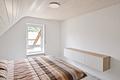 Vermietete Maisonettewohnung in Neckarnähe – Kapitalanlage mit Hauscharakter - Helles Schlafzimmer im Dachgeschoss