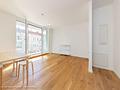 Neuwertiges 2-Zimmer-Appartement mit Balkon in begehrter Lage - livingroom1-min
