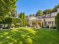 Walmdach-Einfamilienhaus mit schönem Garten, Wintergarten & vielseitigem Souterrain am Isarhochufer - Gartenansicht