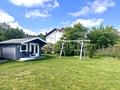 Modernes Zweifamilienhaus mit großem Garten in Stein a. d. Traun - Gartenansicht