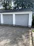 3-Zimmer-Wohnung mit Sonnenterrasse, 400 m² Gartenanteil und beheizten Hobby-Raum in Unterföhring! - Garageneinfahrt