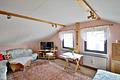 Viel Platz für Ihre Wohnträume: Freistehendes Einfamilienhaus mit Gartenpotenzial in Rheinhausen - DG Zimmer
