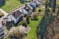 Großzügiges Familienhaus in sonniger Lage mit Sauna, Garten und viel Wohnkomfort - Rückseitige Ansicht