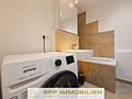 Renovierte 3-Zimmerwohnung mit sonniger West-Loggia in Oberschleißheim - Badezimmer