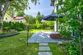 Modernes Einfamilienhaus mit Wärmepumpe, vier Schlafzimmern und sonnigem Garten - Sonnige Südterrasse