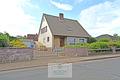Einfamilienhaus mit Garage und Geräteraum in Wehdel - Ansicht