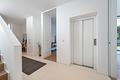Lichterfülltes Bauhaus-Domizil mit Einliegerwohnung, Lift und sonnigem Traumgarten - Personenlift über alle Etagen