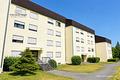 Bezugsfreie 3,5-Zimmer-Wohnung im 4. OG mit Aufzug, großem Balkon und ruhiger Lage in Sackgasse - Rückansicht / Eingangsseite