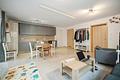 Moderne 2-Zimmer-Wohnung mit Terrasse und Garten in guter Lage - Wohn/-Essbereich Ansicht 3