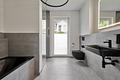 Privater Indoor-Pool & Garten: Exklusive 5-Zimmer-Maisonette mit Haus-im-Haus-Charakter - Designorientierte Badgestaltung