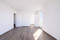 3-Zimmer Panorama-Eckwohnung im 10. OG mit Alpenblick, Südbalkon & Tiefgarage am Ostpark - Wohn- und Essbereich