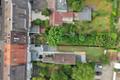 Reihenmittelhaus mit zwei Wohnungen und großzügigem Garten in guter Wohnlage - Drohnenaufnahme