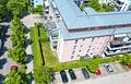 Dachau-Süd:
Sonnige 4-Zimmer-Erdgeschosswohnung mit großem Garten und zwei TG-Stellplätzen - Vogelperspektive