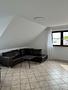 HEGERICH: Attraktive 3-Zimmer-Dachgeschosswohnung mit Terrasse in Oberasbach - Wohnzimmer
