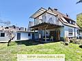 Familientraum!! Großzügige Wohnung mit XXL-Balkon + traumhafter Gartennutzung - Hausansicht
