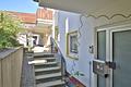 Geschmackvoll möblierte 3-Zimmer-Wohnung mit Garage und Balkon - traumhafter Ausblick inklusive - Wohnungseingang