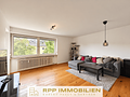 Renovierte 3-Zimmerwohnung mit sonniger West-Loggia in Oberschleißheim - Wohnzimmer