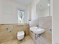 Großzügige 4-Zimmer-Wohnung im 2. Obergeschoss mit Loggia und hochwertiger Ausstattung in Simbach - Gäste-WC