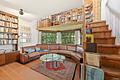 Stadtnah und direkt am Park! Familienheim mit spannender Architektur, 7 Zimmern und Garten - Lounge-Bereich Wohnzimmer mit Galerie