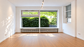 Schöne 5-Zimmer-Wohnung im Loft-Stil in Bestlage von Schwabing - Heller Wohnbereich mit Blick ins Grüne