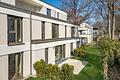 Erstbezug: Elegante 3-Zimmer-Wohnung mit Westterrasse und hochwertiger Ausstattung - Hausansicht 2
