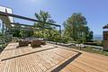 Rarität mit Alpen-Panorama und Seezugang: Ikonische Architekten-Villa mit hoher Privatsphäre - Atemberaubende Rooftop-Terrasse