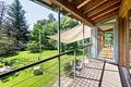 Freistehendes Einfamilienhaus im Chalet-Stil, modern interpretiert - Parkähnlicher Garten